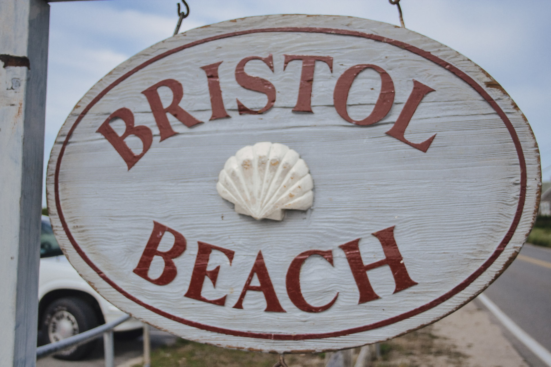 SIGN FEATURING SHELL AND WORDS "BRISTOL BEACH" IN FALMOUTH MASSACHUSETTS